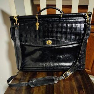 Jack George's custom high polished leather bag